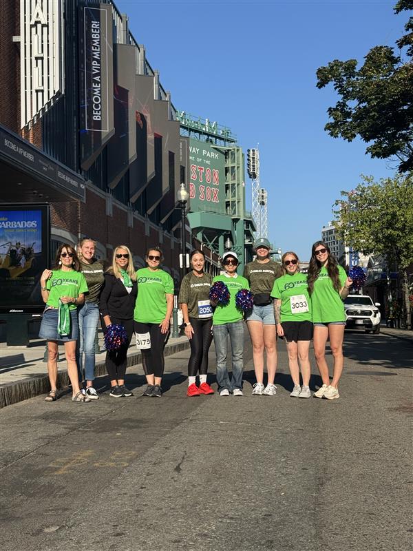 Delta Dental team group photo outside Fenway Park at Run to Home Base