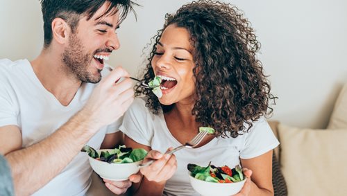 member-newsletter-couple.jpg happy couple eating a salad together